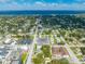 Wide aerial view of a neighborhood near a lake at 1015 Ohio Ave, Saint Cloud, FL 34769