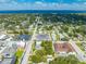 Wide aerial view of a neighborhood near a lake at 1015 Ohio Ave, Saint Cloud, FL 34769