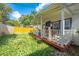 Charming bungalow with a front porch and yard at 1015 Ohio Ave, Saint Cloud, FL 34769
