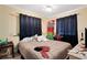 Second bedroom with double bed and plenty of storage at 1015 Ohio Ave, Saint Cloud, FL 34769