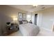 Charming bedroom with a comfortable bed and built in closet at 4227 Sawtooth Ct, Tavares, FL 32778