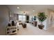 Relaxing Gathering room with comfortable seating and a large-screen TV at 4227 Sawtooth Ct, Tavares, FL 32778