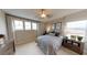 Cozy bedroom with a comfortable bed and plenty of natural light at 4227 Sawtooth Ct, Tavares, FL 32778