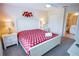Spacious bedroom with king-size bed and en-suite bathroom at 2505 Dharma Cir, Kissimmee, FL 34746