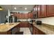 Spacious kitchen with granite countertops and stainless steel appliances at 8860 Candy Palm Rd, Kissimmee, FL 34747