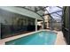 Relaxing screened pool area, perfect for outdoor enjoyment at 8860 Candy Palm Rd, Kissimmee, FL 34747