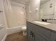 Updated bathroom with gray vanity and tub shower combo at 3045 Aaron Burr Ave # 10, Winter Park, FL 32792