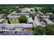 Aerial view of community featuring multiple buildings and parking at 3045 Aaron Burr Ave # 10, Winter Park, FL 32792