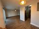 Bright living room with hardwood floors and sliding glass doors at 3045 Aaron Burr Ave # 10, Winter Park, FL 32792
