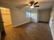 Bright bedroom with ceiling fan and ample closet space at 3045 Aaron Burr Ave # 10, Winter Park, FL 32792