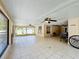 Screened porch with tile floor and ceiling fans at 119 Talavera Ln, Kissimmee, FL 34758