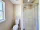 Bathroom with toilet and shower stall at 119 Talavera Ln, Kissimmee, FL 34758