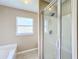 Bathroom with shower stall and bathtub at 119 Talavera Ln, Kissimmee, FL 34758