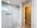 Walk in shower with marble tile and separate toilet area at 119 Talavera Ln, Kissimmee, FL 34758