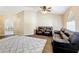 Living room featuring a ceiling fan and neutral decor at 119 Talavera Ln, Kissimmee, FL 34758