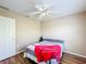 Bedroom with double bed, ceiling fan, and closet at 119 Talavera Ln, Kissimmee, FL 34758