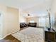 Spacious living room featuring dark brown leather furniture and a decorative rug at 119 Talavera Ln, Kissimmee, FL 34758