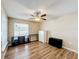 Bedroom with ceiling fan, dresser, and large window at 119 Talavera Ln, Kissimmee, FL 34758