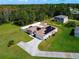 Aerial view of house with solar panels and large yard at 119 Talavera Ln, Kissimmee, FL 34758