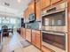 Modern kitchen with stainless steel appliances and granite countertops at 678 Irvine Ranch Rd, Kissimmee, FL 34759