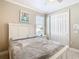 Charming bedroom with a queen bed and built in closet at 678 Irvine Ranch Rd, Kissimmee, FL 34759