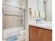 Bathroom featuring a shower/tub combo and updated vanity at 678 Irvine Ranch Rd, Kissimmee, FL 34759