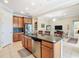 Well-equipped kitchen with granite counters, stainless steel appliances, and ample cabinet space at 678 Irvine Ranch Rd, Kissimmee, FL 34759