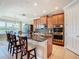 Spacious kitchen with granite countertops and stainless steel appliances at 678 Irvine Ranch Rd, Kissimmee, FL 34759