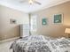 Spacious bedroom with a queen bed and plenty of natural light at 678 Irvine Ranch Rd, Kissimmee, FL 34759