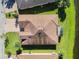 Aerial view of house showing roofline and landscaping at 678 Irvine Ranch Rd, Kissimmee, FL 34759