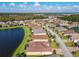 Aerial view of neighborhood with lakefront access at 678 Irvine Ranch Rd, Kissimmee, FL 34759