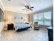 Bright bedroom with large window and ceiling fan at 678 Irvine Ranch Rd, Kissimmee, FL 34759