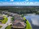 Aerial view of home on a lakefront community at 678 Irvine Ranch Rd, Kissimmee, FL 34759