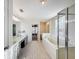 Large bathroom with double sinks, garden tub, and shower at 307 Norfolk St, Celebration, FL 34747