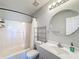 Clean bathroom with a shower/tub combo and vanity at 307 Norfolk St, Celebration, FL 34747