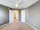 Neutral bedroom with ceiling fan and carpet flooring at 307 Norfolk St, Celebration, FL 34747