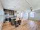 Open concept kitchen with granite island and stainless steel appliances at 307 Norfolk St, Celebration, FL 34747