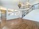 Open floor plan with kitchen, dining area, and hardwood floors at 307 Norfolk St, Celebration, FL 34747