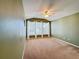 Upstairs bedroom with carpet, ceiling fan, and large windows at 307 Norfolk St, Celebration, FL 34747