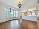 Spacious living room with hardwood floors and large windows at 307 Norfolk St, Celebration, FL 34747