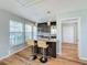 Modern kitchen with granite island and stainless steel appliances at 307 Norfolk St, Celebration, FL 34747