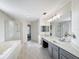 Spacious bathroom with double vanity, soaking tub, and separate shower at 307 Norfolk St, Celebration, FL 34747
