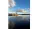 Stunning lake view with tranquil waters and blue skies at 3612 Hidden River Ln, Tavares, FL 32778