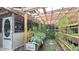Beautiful backyard garden featuring a pergola and various plants at 112 10Th St, St Cloud, FL 34769