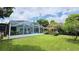 Large backyard with pool, pergola, and garden at 112 10Th St, St Cloud, FL 34769