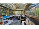 Indoor garden greenhouse with potting supplies and shelving at 112 10Th St, St Cloud, FL 34769