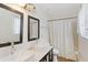 Clean bathroom with double sinks, large mirror, and shower/tub combo at 4758 Wyresdale St, Orlando, FL 32808