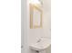 Small bathroom with pedestal sink and mirror at 4758 Wyresdale St, Orlando, FL 32808