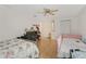Bedroom with two twin beds, dresser, and ceiling fan at 4758 Wyresdale St, Orlando, FL 32808