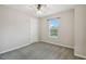 Well-lit bedroom with window and ceiling fan at 795 Aviara Ln, Kissimmee, FL 34759